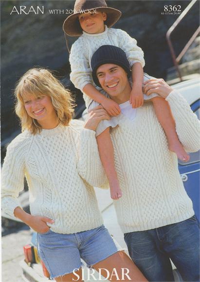 Sirdar 8362 Sweaters in Aran (#4) weight yarn. For the whole family in 3 neck styles.